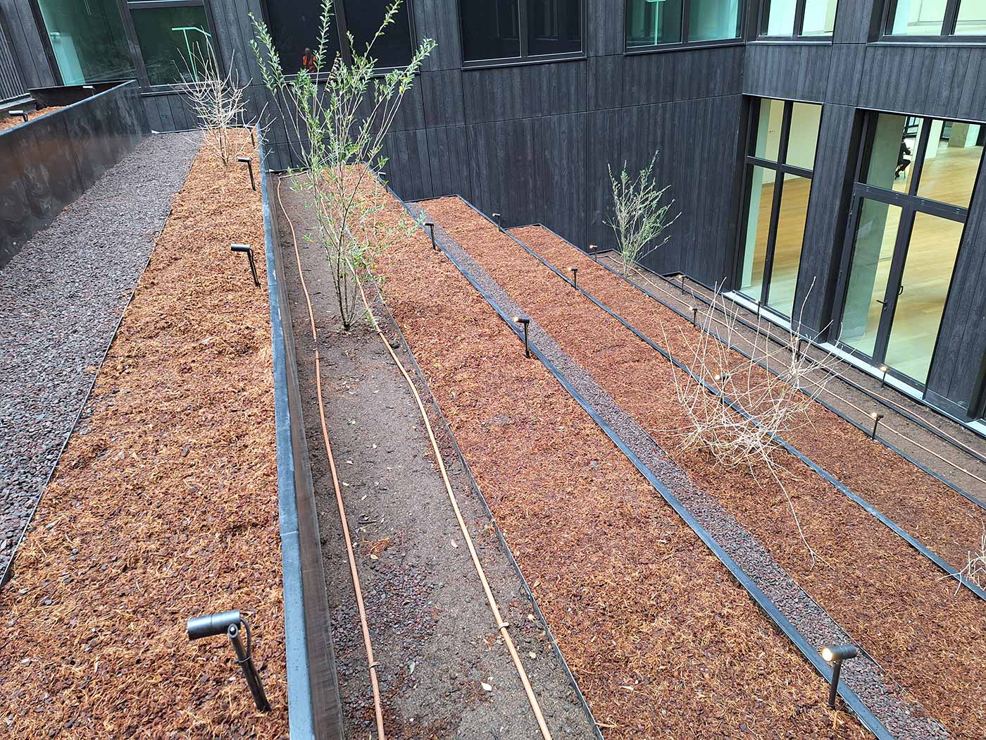 Projet de jardinières et costières à niveau pour cet immeuble de bureaux