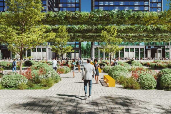 Personnes marchant dans la ville aménagée avec des arbres, des bancs et des espaces verts.